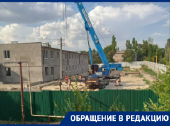 Стоянку для большегрузов строят в Волгограде на месте детского сада