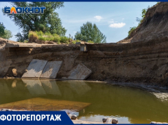 Обвалившийся мост и берег Ахтубы под Волгоградом в объективе фотографа
