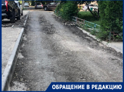 При ремонте дороги на Новодвинской в Волгограде решили оставить главную яму