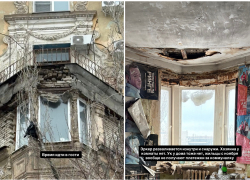 Ничейная квартира осыпается на головы прохожих над входом в притягательное место Волгограда